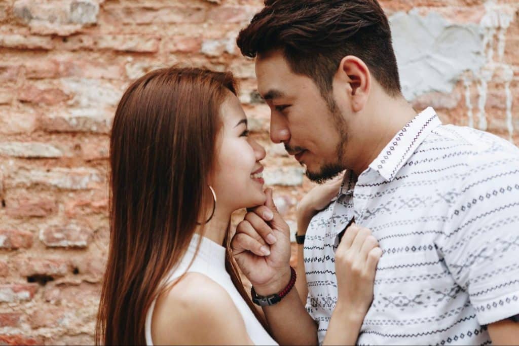 A man and woman looking at each other