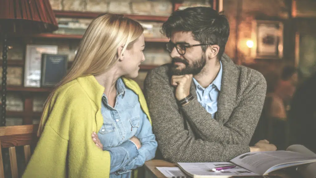 A couple looking at each other while smiling