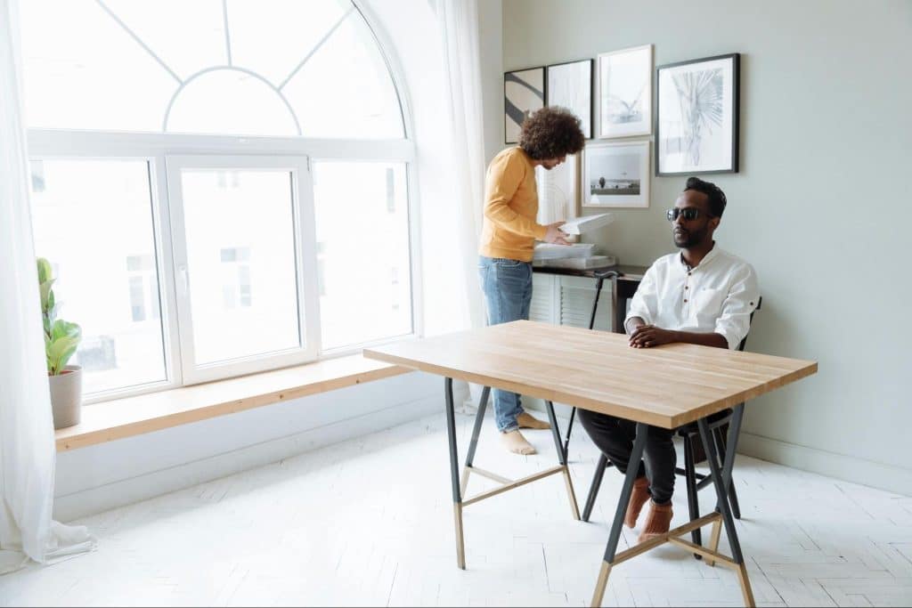 A man and woman busy with their own life