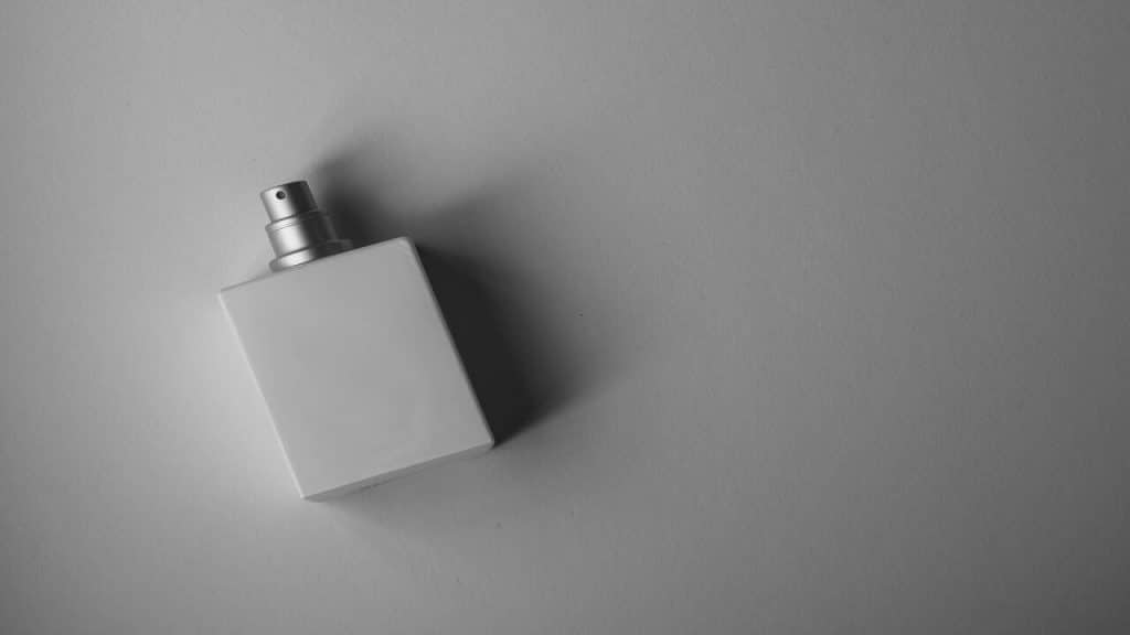 A white perfume bottle