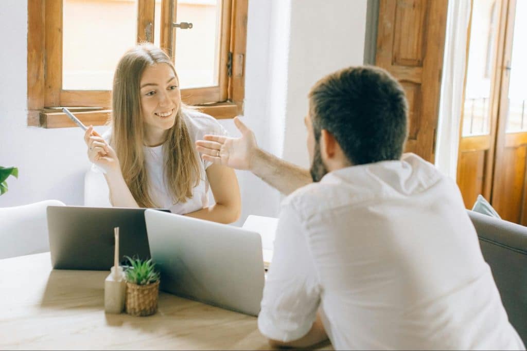 A man and woman talking
