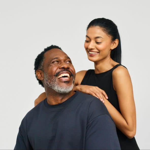 A man and woman looking at each other