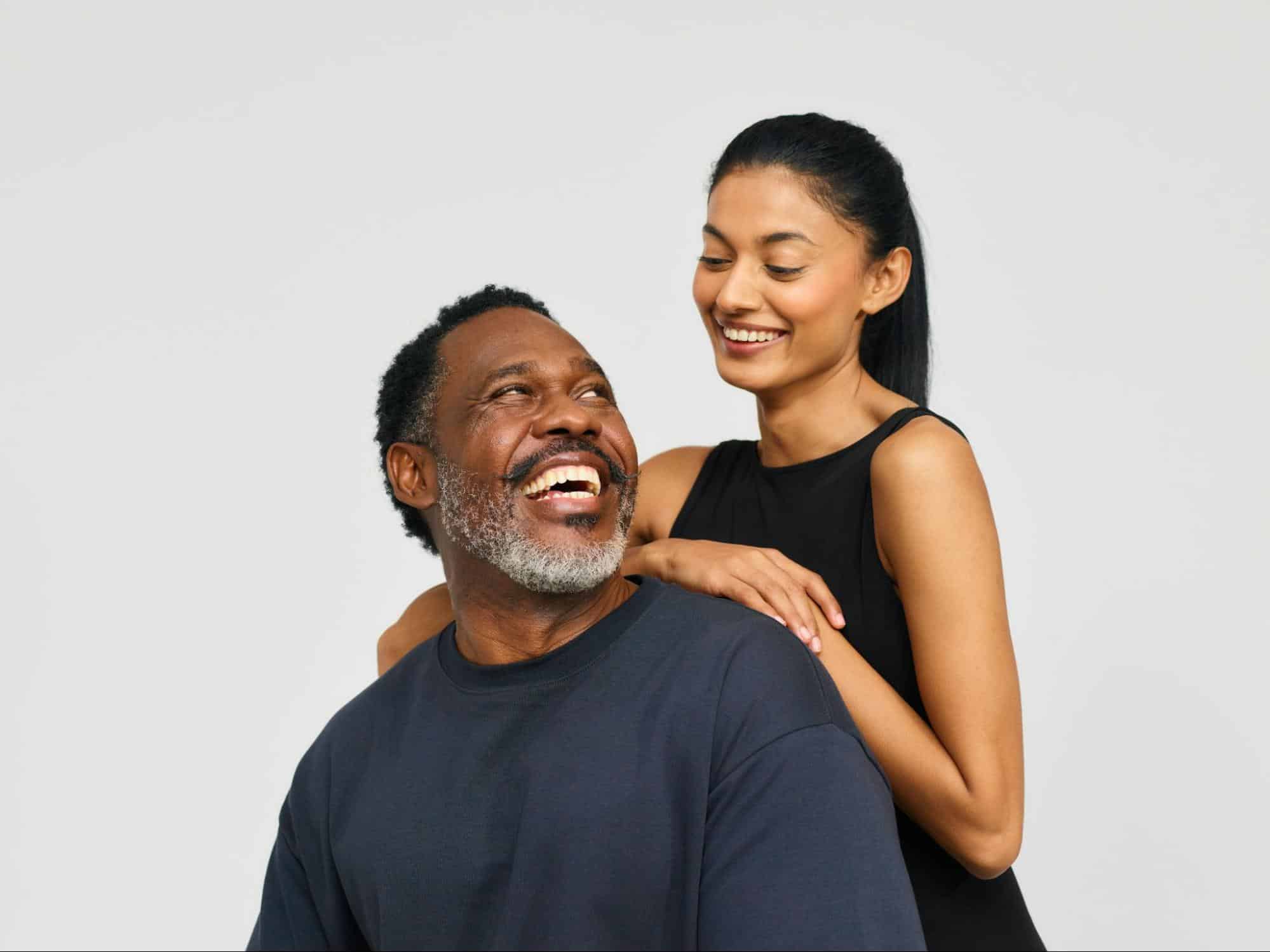 A man and woman looking at each other