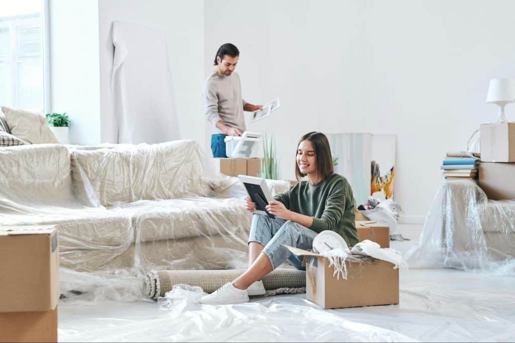 A man and woman busy doing their own way