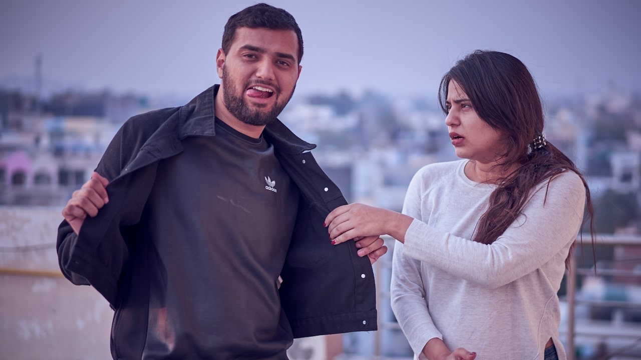 A man is making fun of her girlfriend.