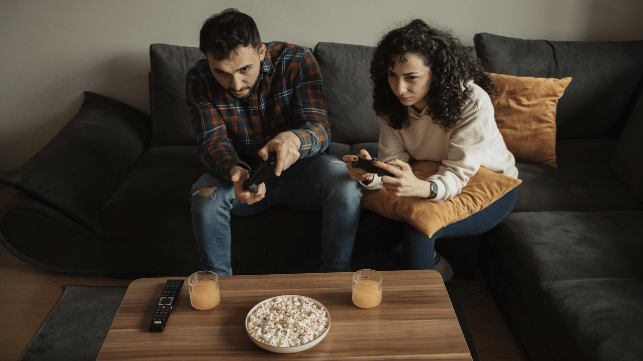 A couple playing video games together