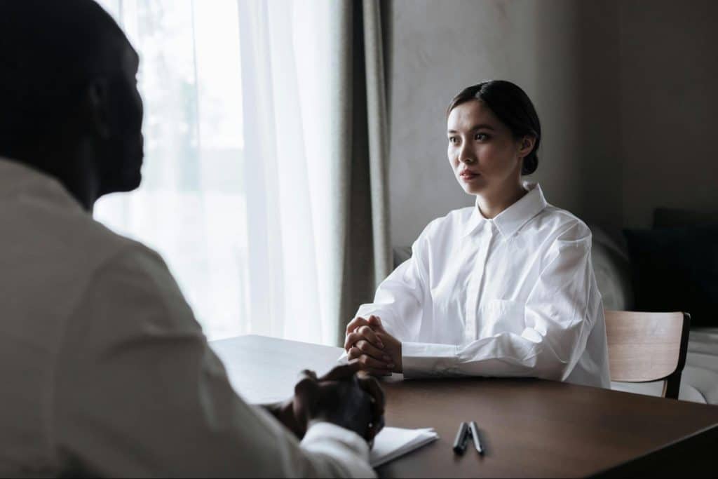 A man listening to woman