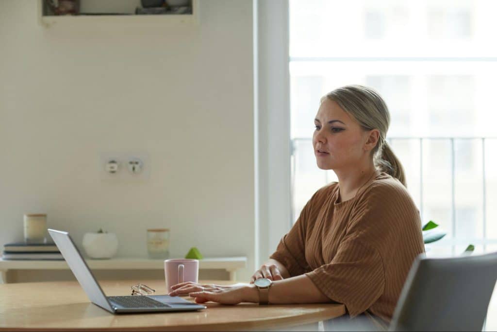 A woman busy with her laptop.