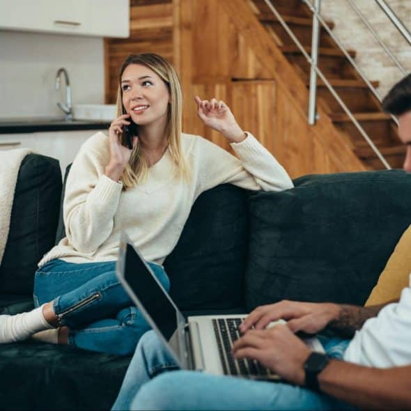 A man and woman at the living room