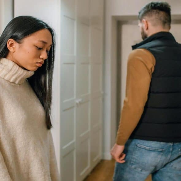 A couple looking upset at each other