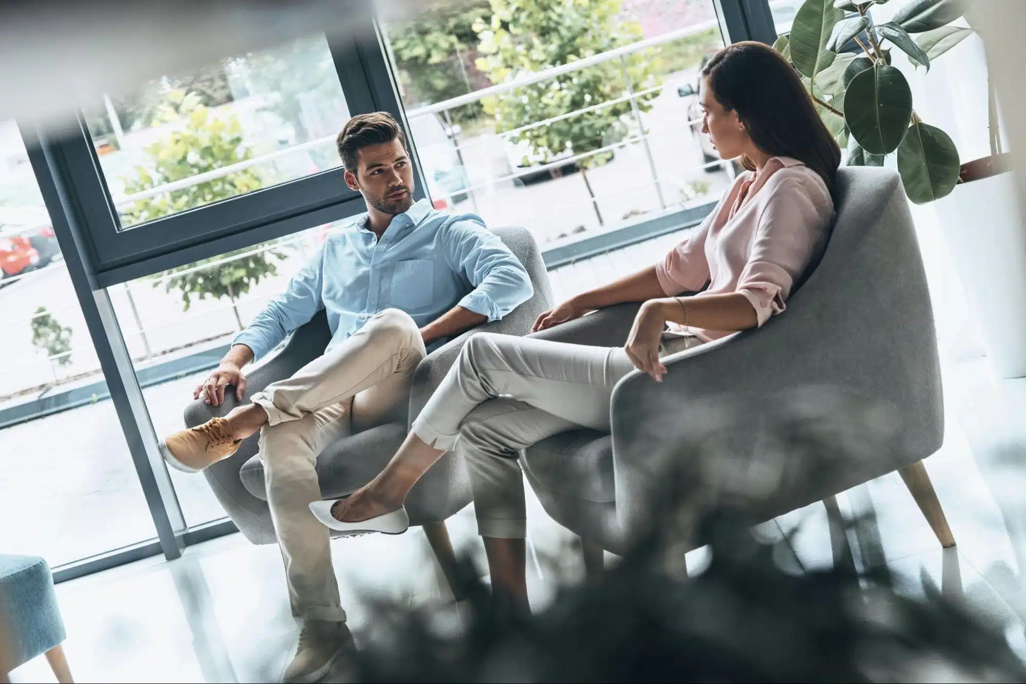 A man and woman looking at each other
