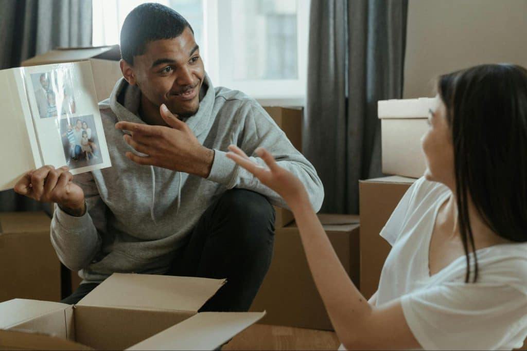 A man showing something to woman