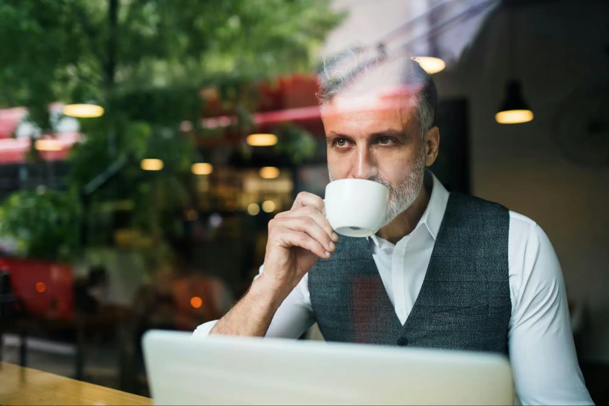 A man sipping coffee 