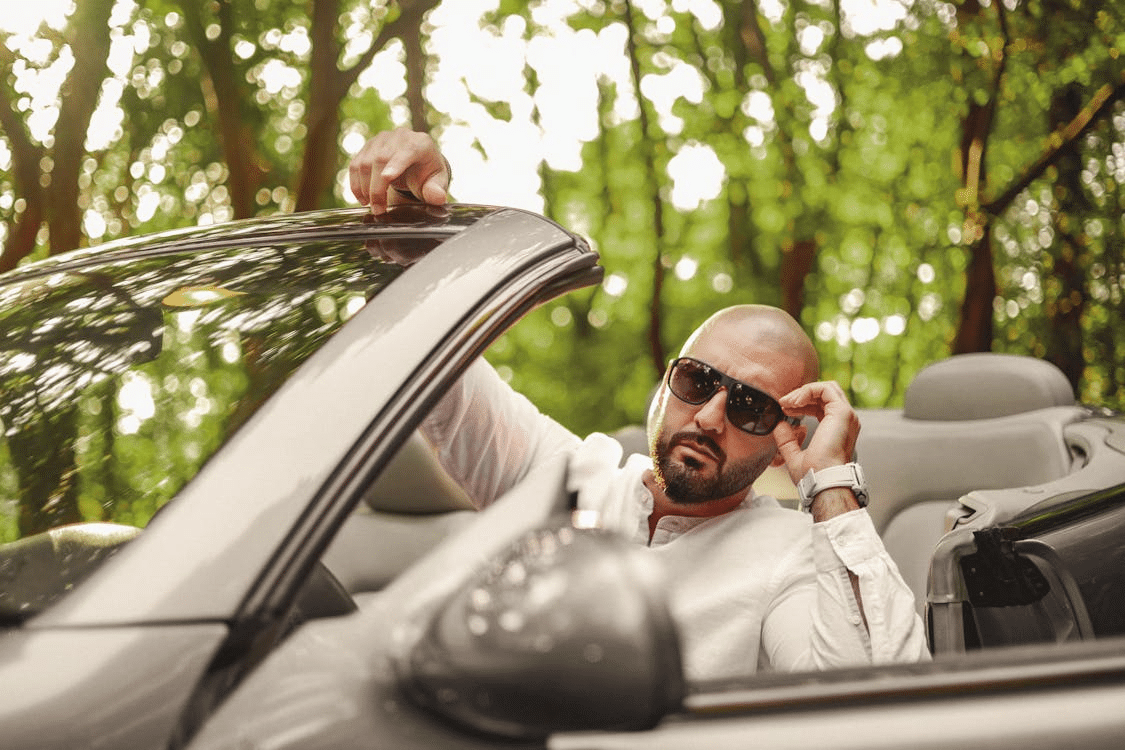 A man driving a car