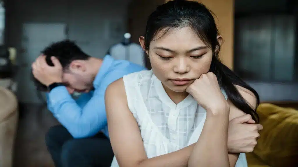 A couple looking sad after an argument