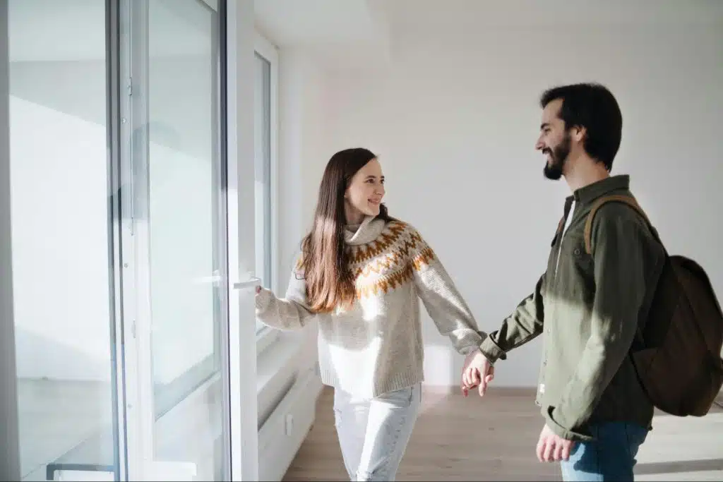 A man and woman holding hands