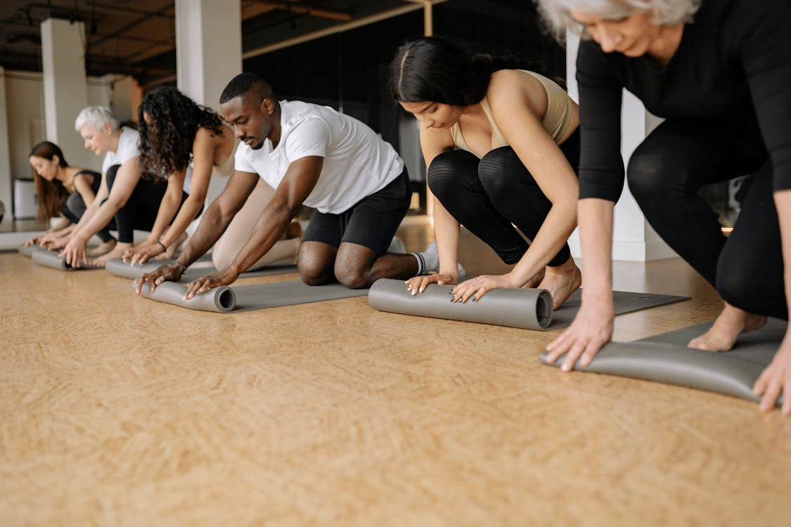 A man in a yoga class