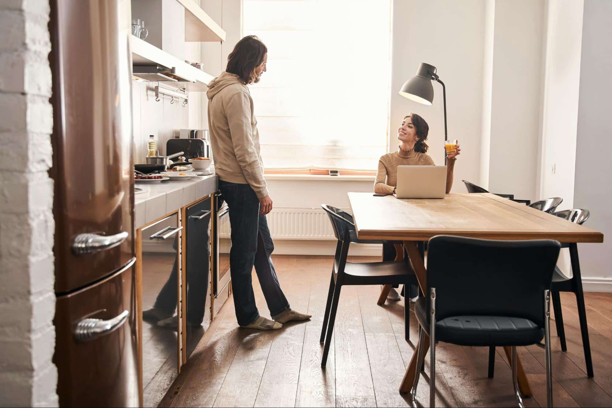 A man and woman having a casual conversation