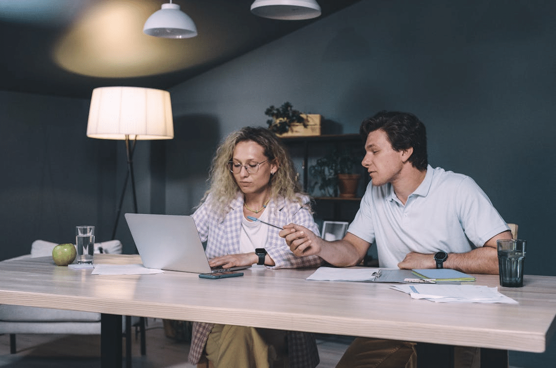 A couple working at a table