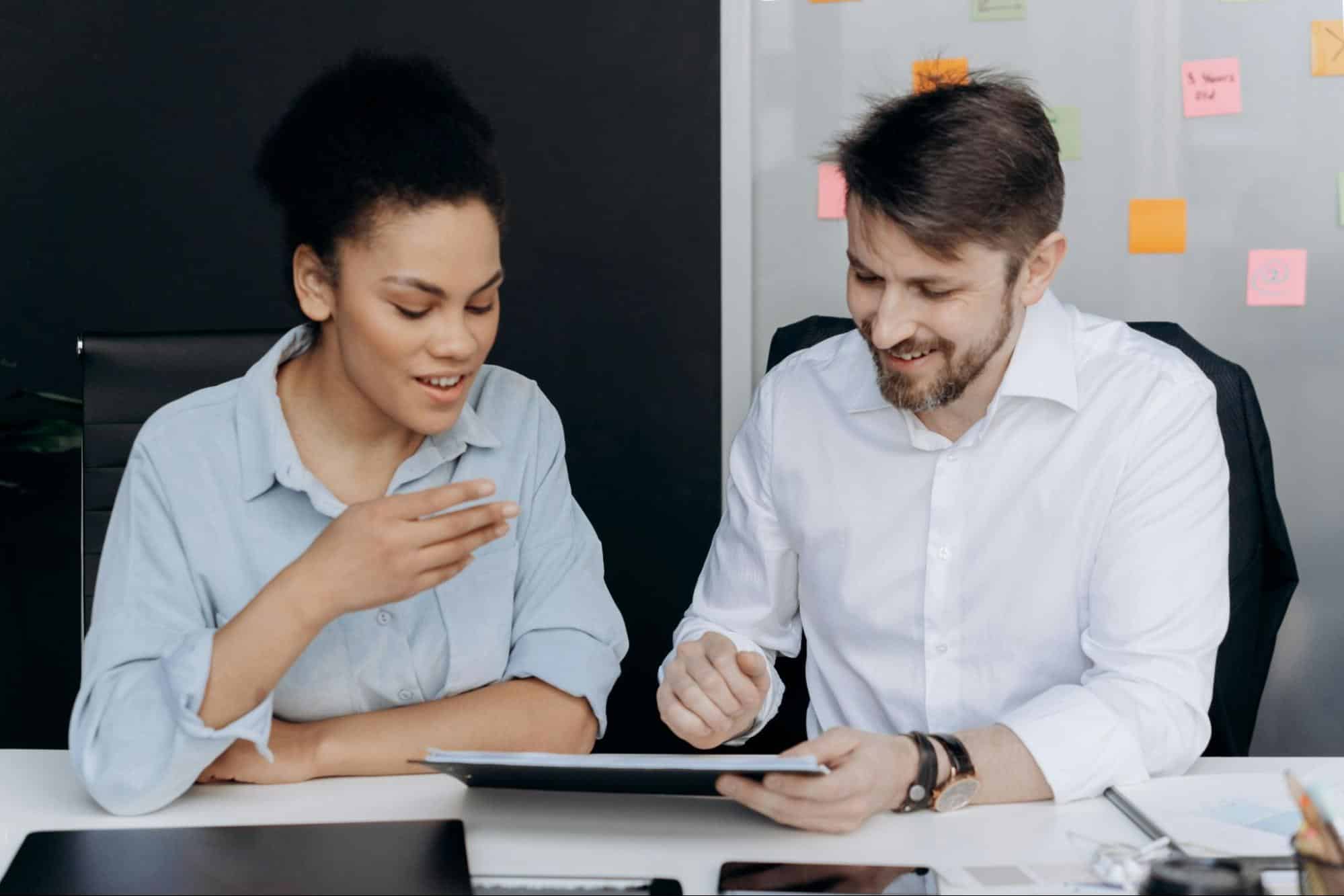 A man and woman busy working