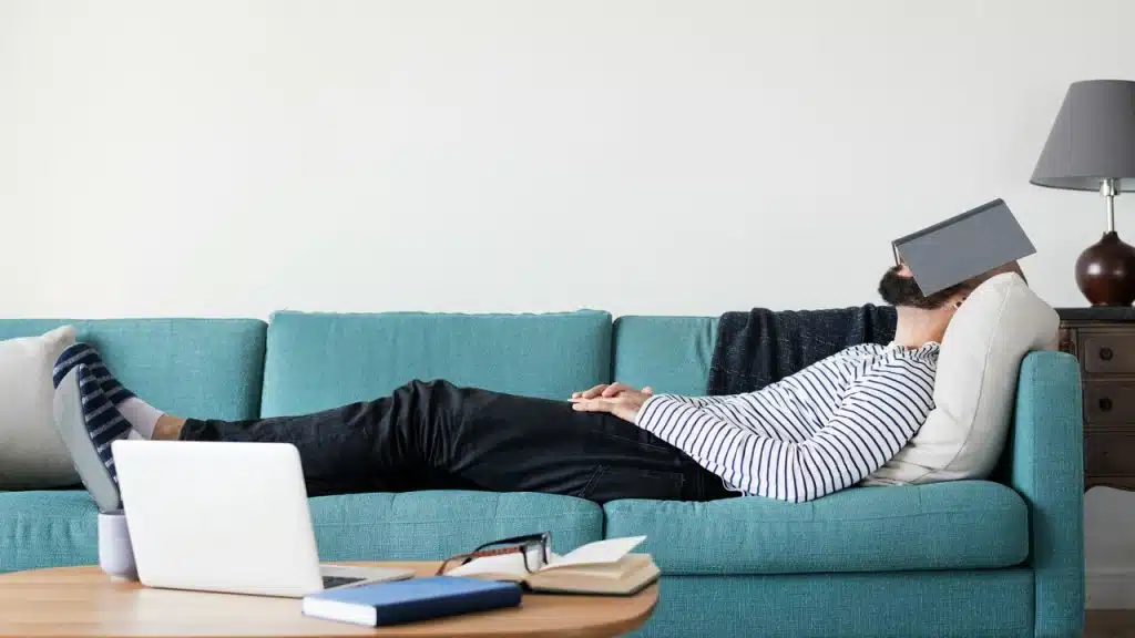 A man sleeping on the couch