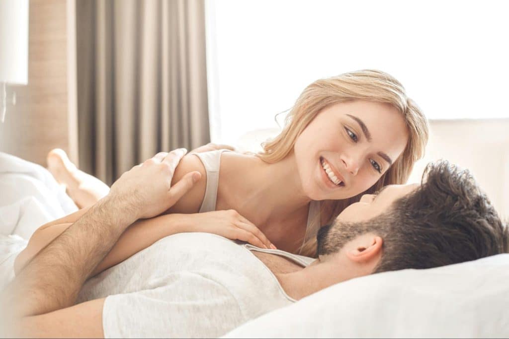 A man and woman looking at each other
