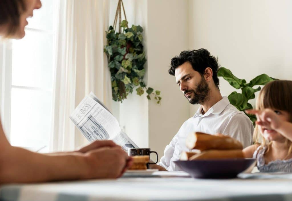 A man and woman at the breakfast table