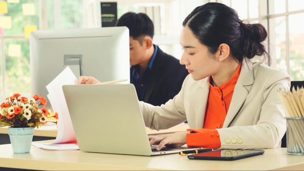 A woman keeping herself busy with work