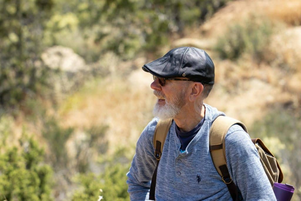 A mature man hiking.