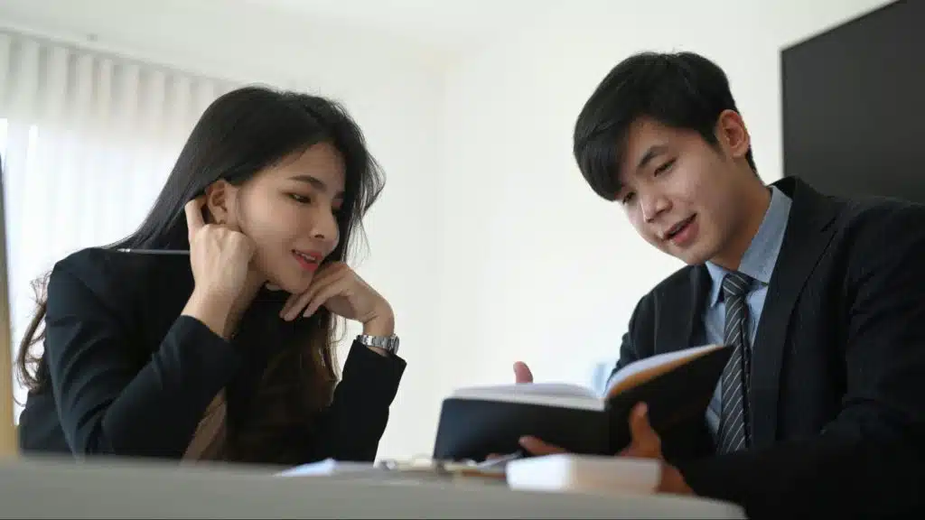 A man and woman talking about their finances