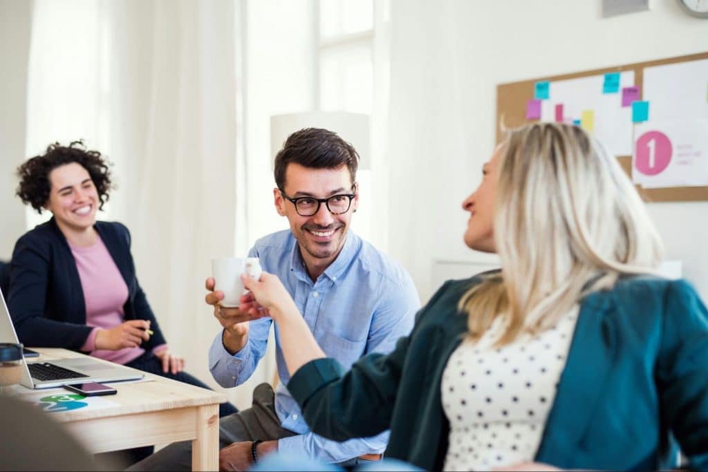 A man doing “little updates” to woman