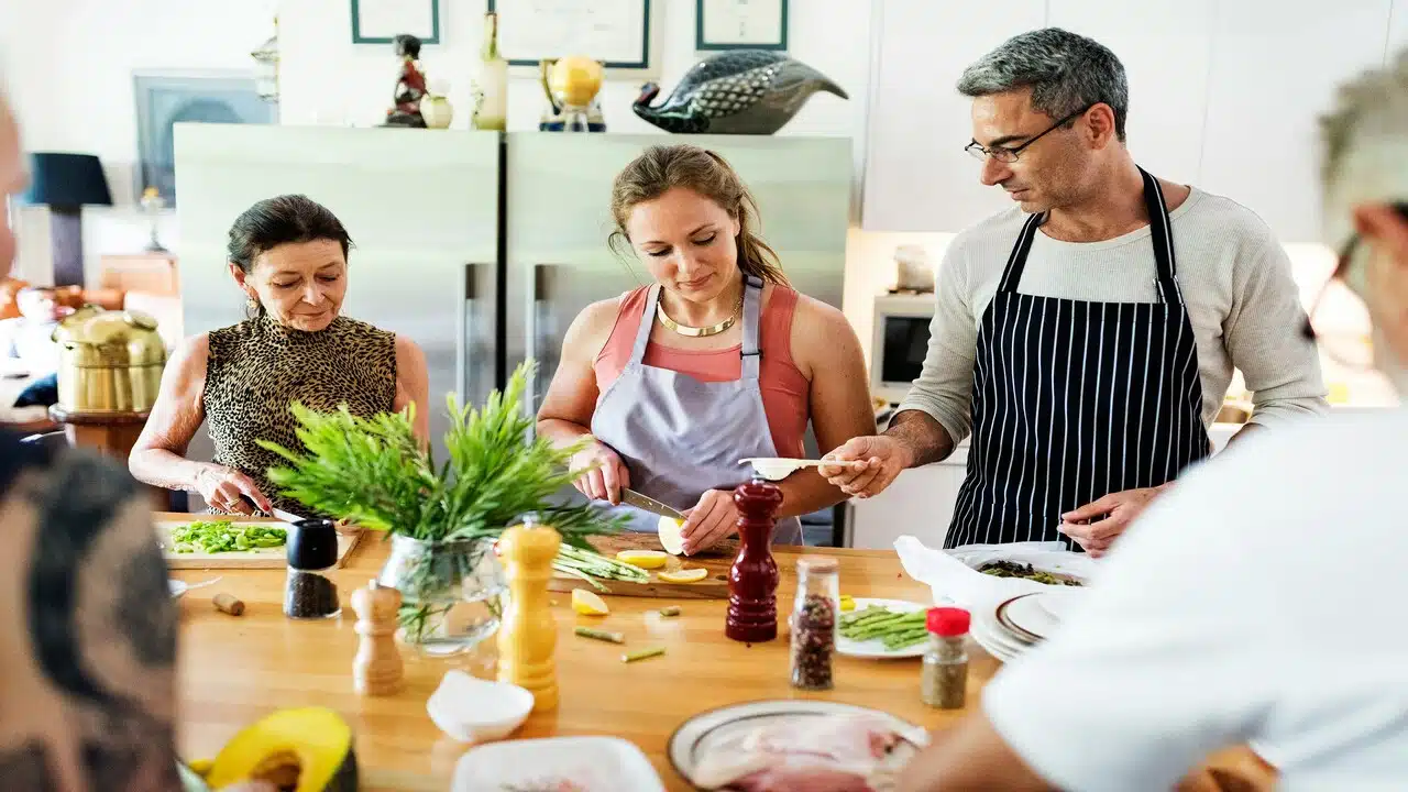 A woman cooking with her friends
