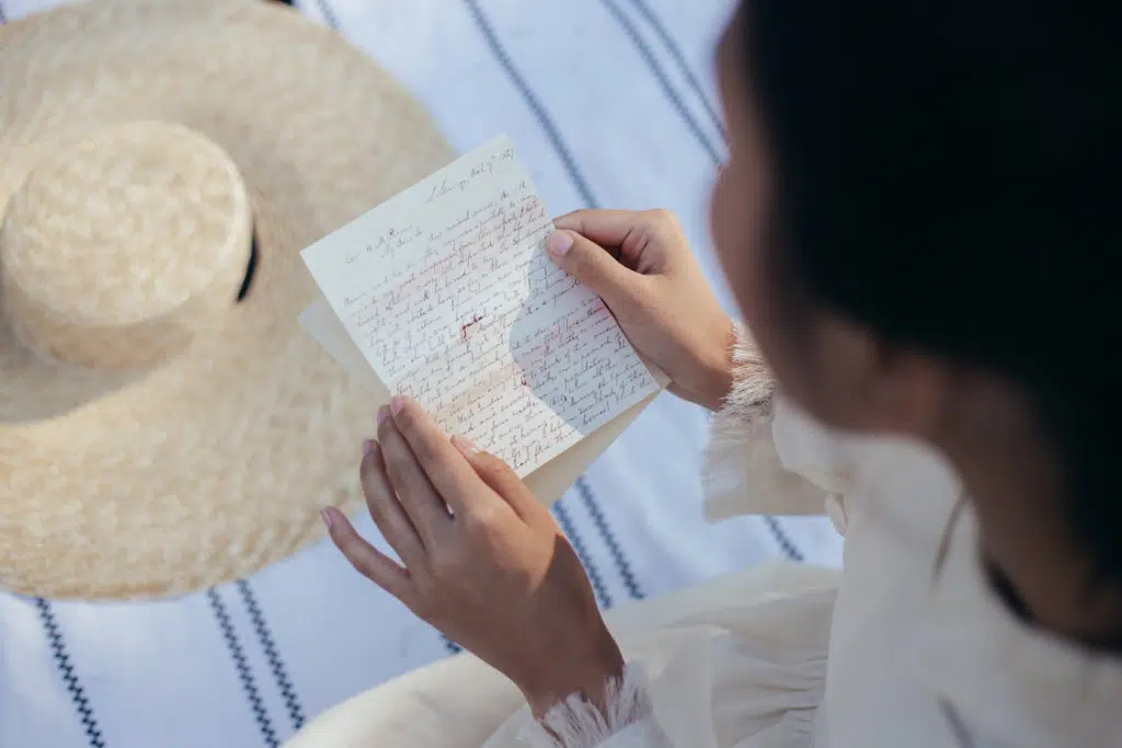 A woman reading a letter