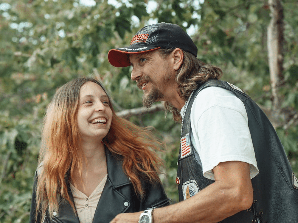 A father and daughter having a fun conversation