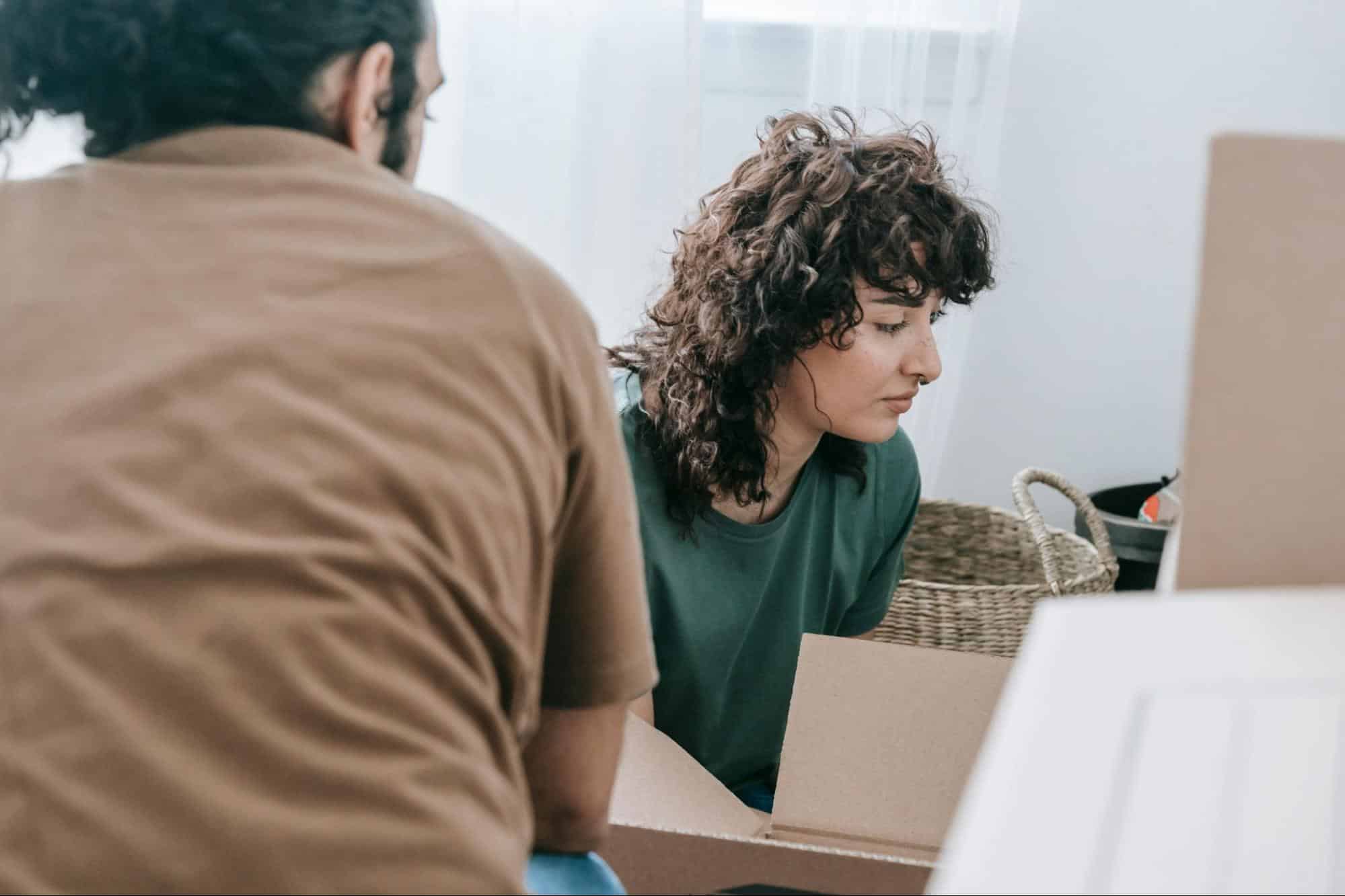 A man helping a woman
