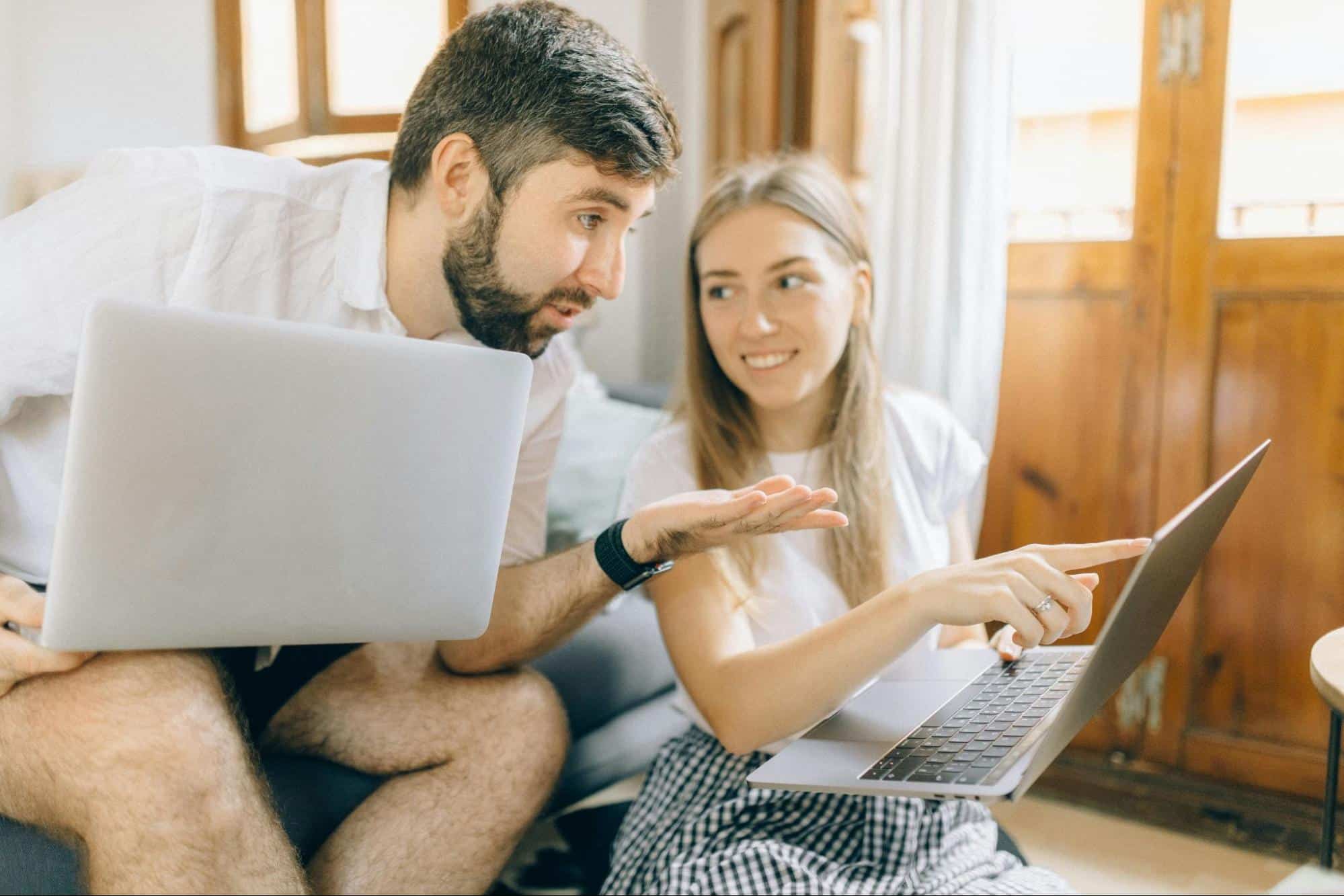 A man saying something to woman