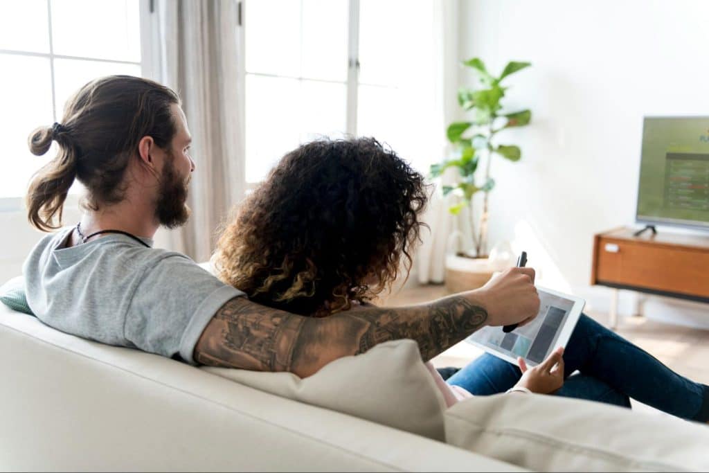 A man and woman at the living room