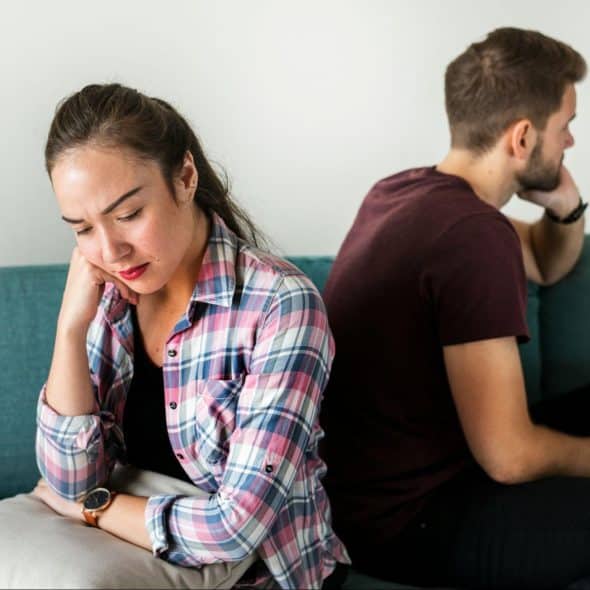 A man and woman not talking to each other