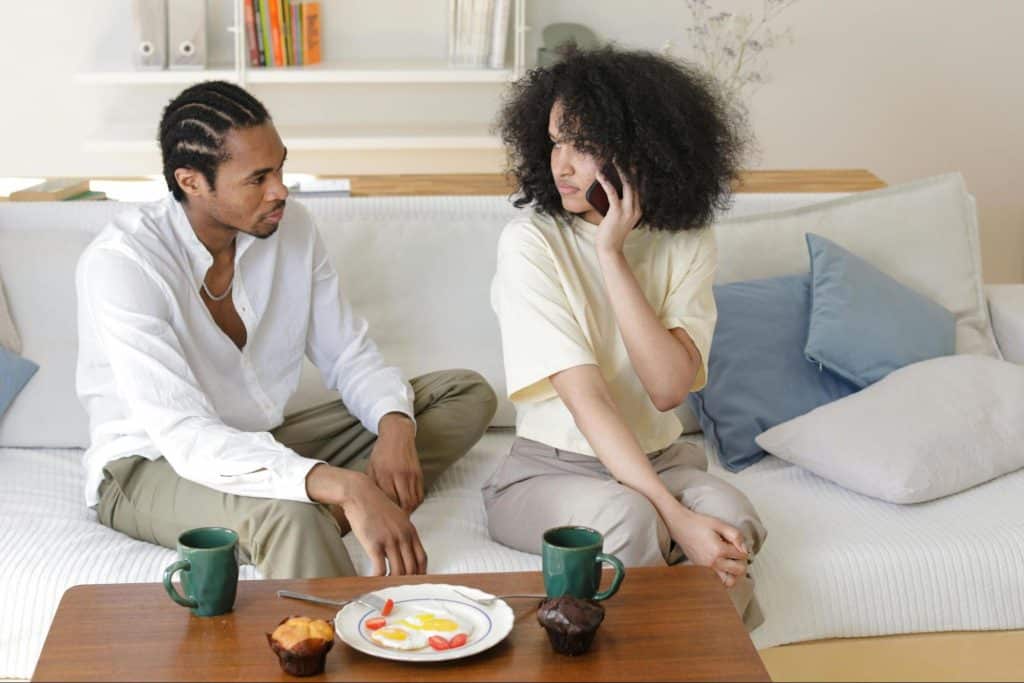 A man looking at the woman