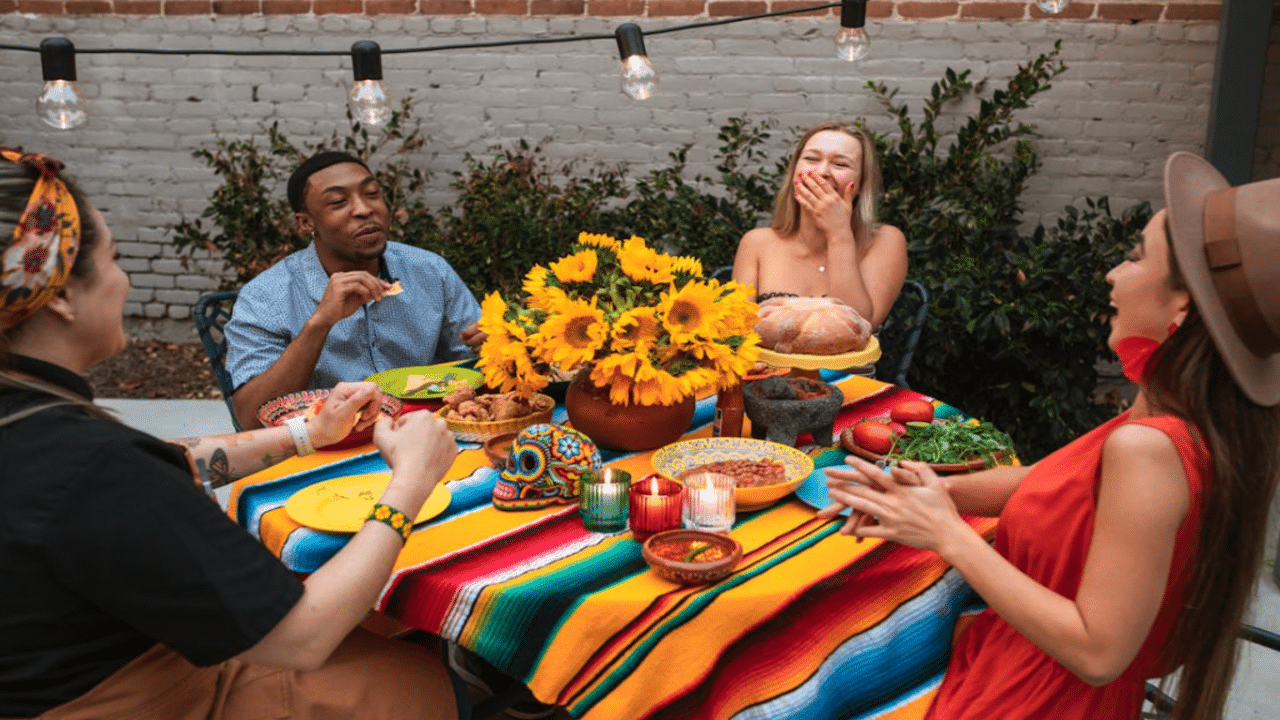 Friends laughing during a meal