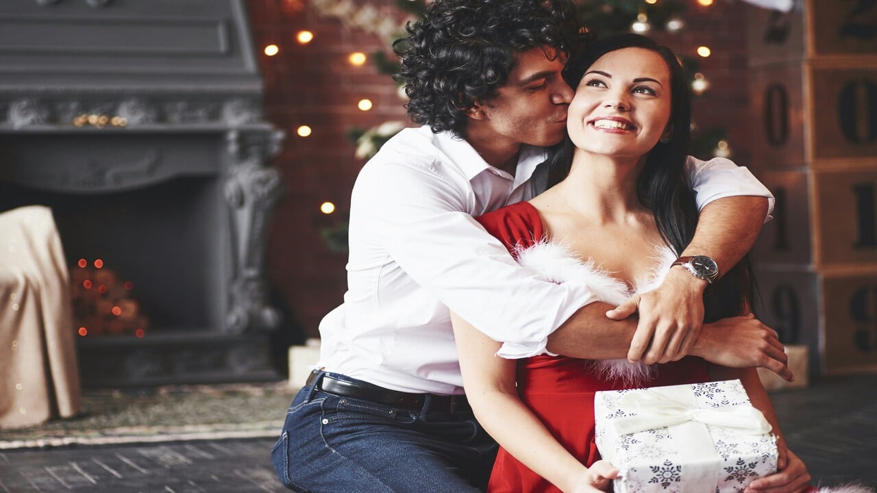 A couple celebrating Christmas together
