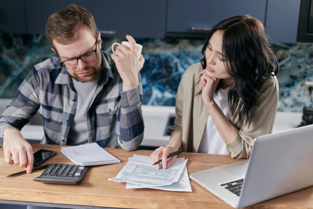 A couple budgeting.