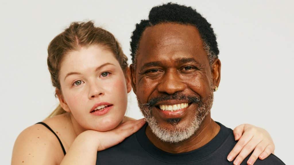 A man and a woman posing for a picture.