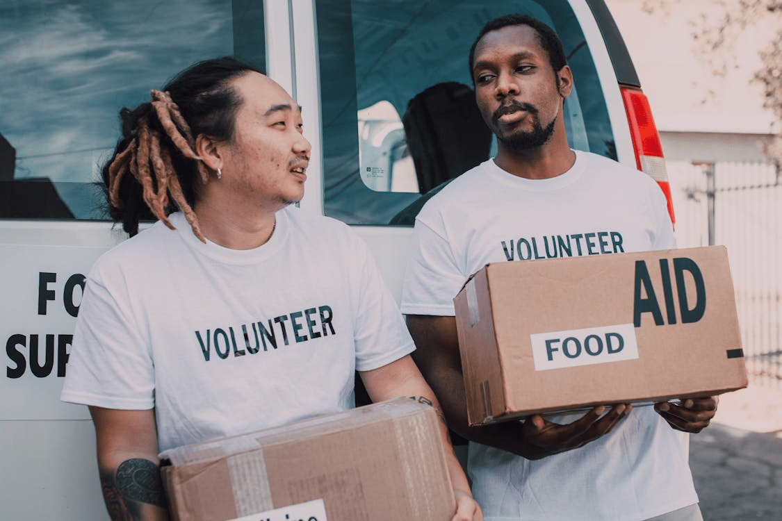 Two men volunteering