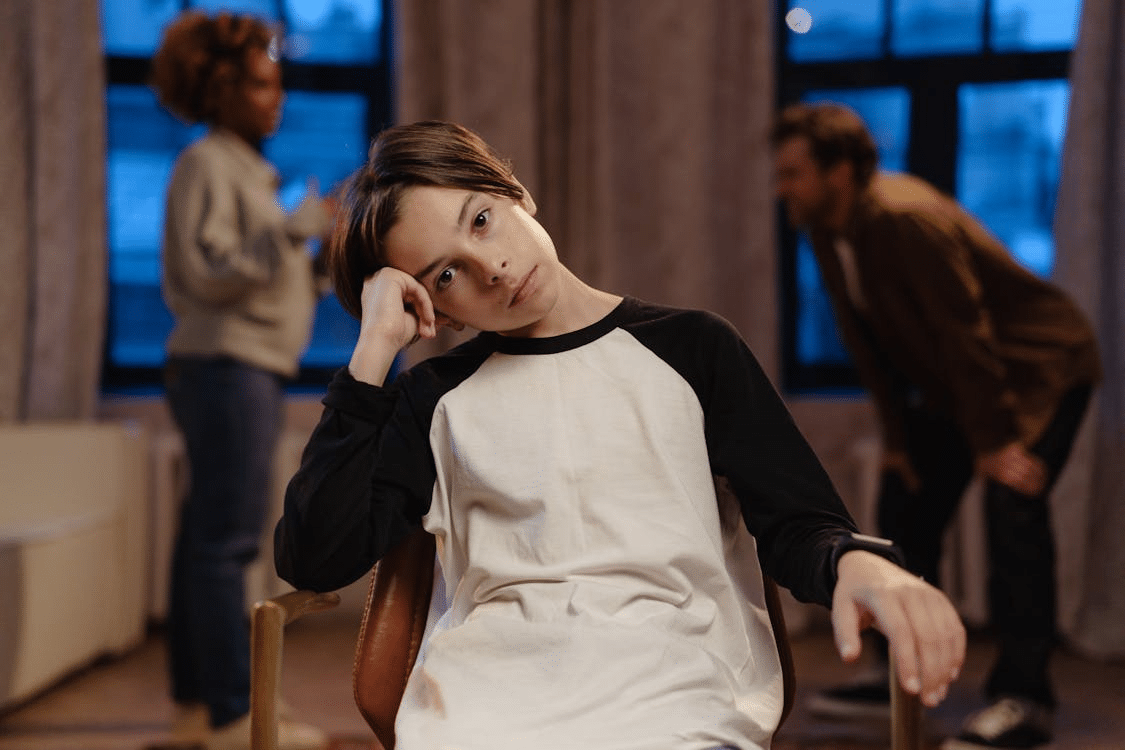 A Boy Sitting on a Chair