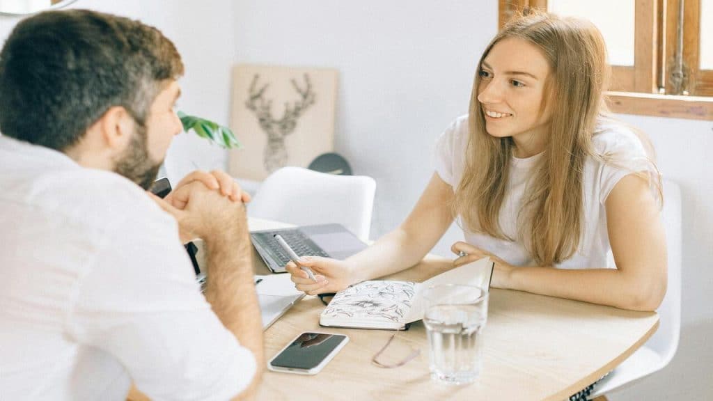 A couple talking at home