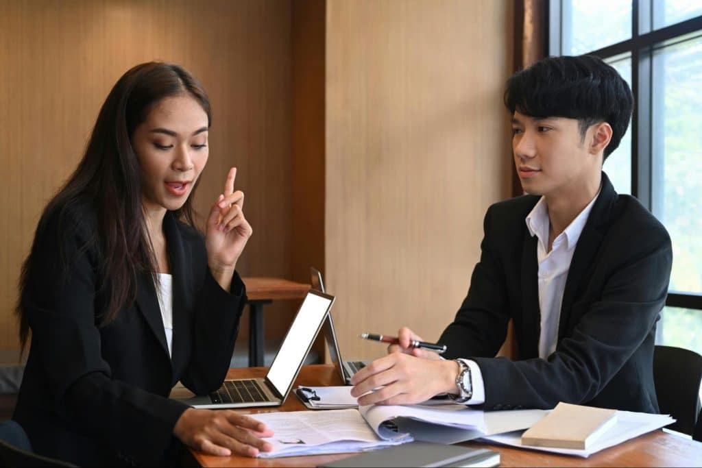 A man and woman talking about their finances