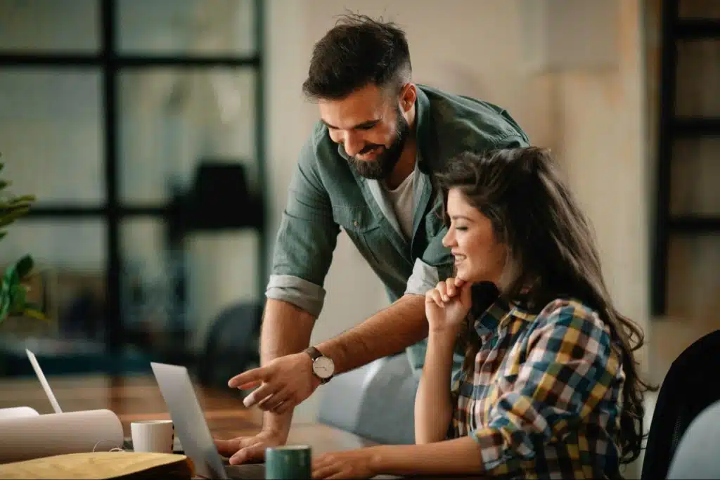 A man teaching a woman 