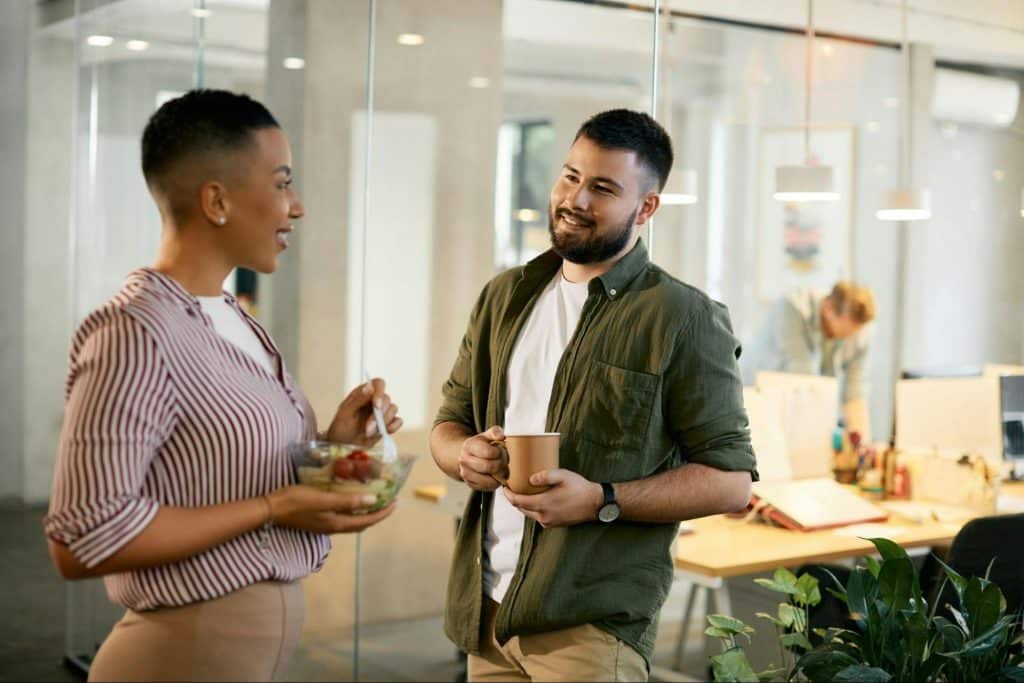 A man and woman smiling at each other