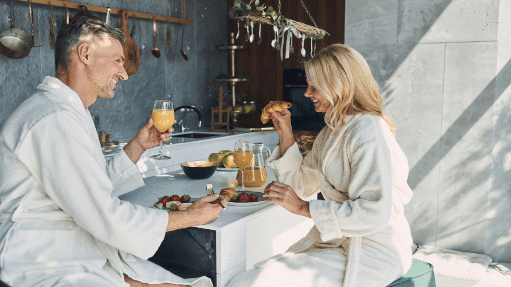 A mature couple enjoying breakfast together